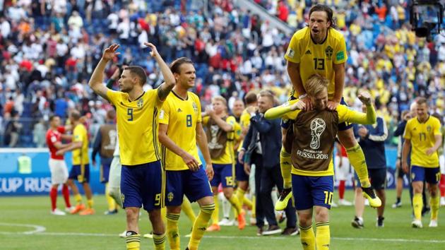 Sweden’s players celebrate after beating Switzerland in the FIFA World Cup Rd of 16 match 1-0 and booking their spot in the quarter-finals. (REUTERS)