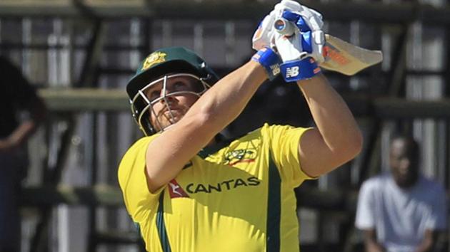 Aaron Finch celebrates sfter coring a century during Australia’s T20 match against Zimbabwe at Harare Sports Club on Tuesday. (AP) Aaron Finch celebrates sfter coring a century during Australia’s T20 match against Zimbabwe at Harare Sports Club on Tuesday. (AP)