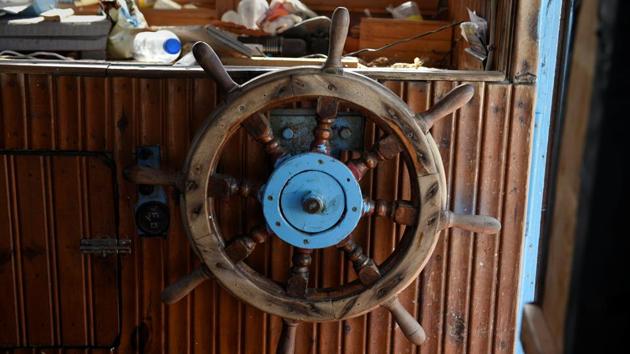 The steering wheel of Ioannis Loukakis' fishing boat ‘Smaragdi’ is seen in the village of Sarti. Hundreds of fishermen like him are turning in their boats and their licences, partly because catches are down, partly because the EU and the Greek government are offering them cash to leave the trade, under a scheme to protect fish stocks. (Alexandros Avramidis / REUTERS)