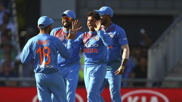 But Kuldeep Yadav, center, took three wickets in the 14th over to leave the hosts in all sorts of trouble. (AP)