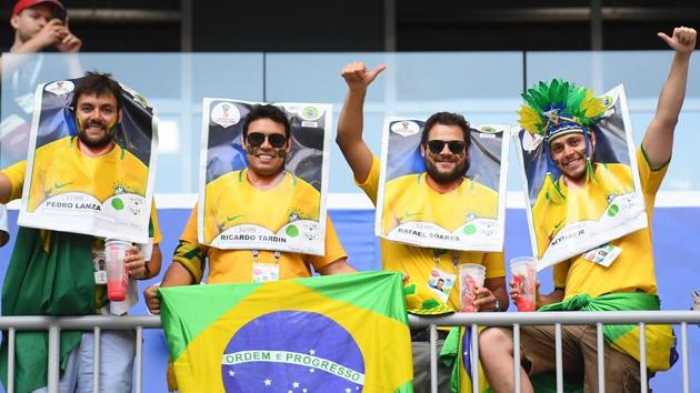 Brazil's fans cheer prior to the Russia 2018 World Cup round of 16 football match between Brazil and Mexico at the Samara Arena in Samara. (AFP) 