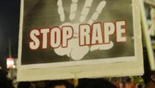 Four accused tied the victim to a tree and allegedly raped her. On seeing flashlights of a vehicle in the area, the accused fled the spot leaving the victim there. (HT File Photo) Four accused tied the victim to a tree and allegedly raped her. On seeing flashlights of a vehicle in the area, the accused fled the spot leaving the victim there. (HT File Photo)