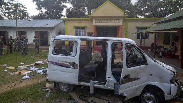 Paramilitary force personnel keep vigil near a damaged vehicle after an angry mob lynched one person and injuring others at a makeshift in Tripura State Rifles (TSR) camp in Mohanpur, on the outskirts of Agartala on June 29, 2018. (AFP) Paramilitary force personnel keep vigil near a damaged vehicle after an angry mob lynched one person and injuring others at a makeshift in Tripura State Rifles (TSR) camp in Mohanpur, on the outskirts of Agartala on June 29, 2018. (AFP)