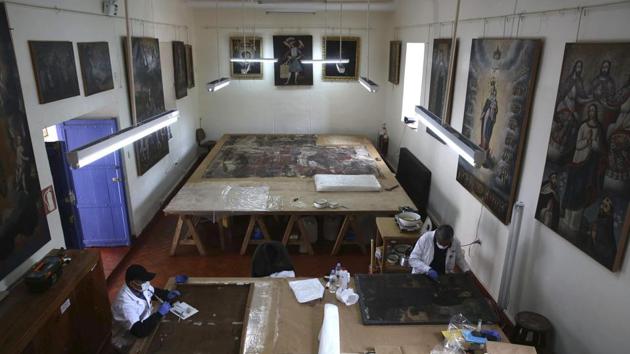 This facility, opened in 2003, claims to be the only one in Peru and has already made contributions to the country’s cultural heritage. Between 2015 and 2017, it rescued more than 500 paintings, sculptures, and ceramic pieces. This old colonial palace high in the Andes, crowded with treasures from Peru’s golden age, feels more like an emergency room than a workshop for recovering artwork. (Martin Mejia / AP) 