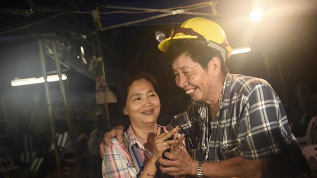 Family members of a missing boy celebrate following news that all members of the team were alive. However, just one individual panicking in the water could have a disastrous ripple effect. As per experts once communication lines are established families must keep their cool and have stressed on the necessity of a good leader who can turn this experience into “an adventure as opposed to a challenge.” (Lillian Suwanrumpha / AFP)