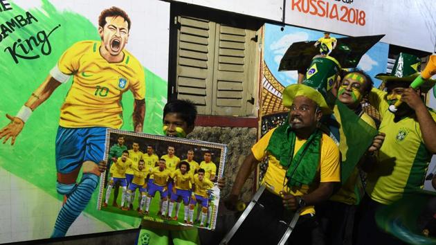 Indian fans of Brazilian football team celebrate during the FIFA 2018 World Cup last 16 football match between Brazil and Mexico. Brazil beat Mexico 21-0. (AFP) 