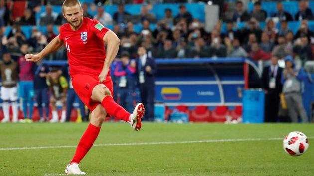 England's Eric Dier scores a penalty during the shootout. (REUTERS)