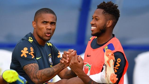 Brazil forward Douglas Costa (L) and midfielder Fred take part in a training session at the Yug Sport Stadium in Sochi. (AFP)