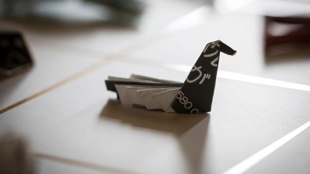 “I discovered many of them were folded in shapes of traditional good luck items in Japan, like a fan, a crane and a turtle,” Tatsumi said. Motivated by this variety, in April 2016, he set off on a year-long road trip, asking hundreds of eateries from sushi restaurants to noodle stands to share their transformed paper sleeves with him. (Harumi Ozawa / AFP) “I discovered many of them were folded in shapes of traditional good luck items in Japan, like a fan, a crane and a turtle,” Tatsumi said. Motivated by this variety, in April 2016, he set off on a year-long road trip, asking hundreds of eateries from sushi restaurants to noodle stands to share their transformed paper sleeves with him. (Harumi Ozawa / AFP)
