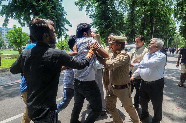 Protestors at Lucknow University being detained by police, in Lucknow. (PTI Photo) Protestors at Lucknow University being detained by police, in Lucknow. (PTI Photo)