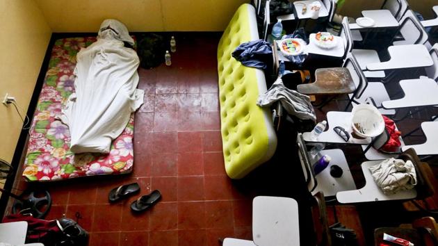 A university student sleeps inside a classroom at the Autonomous University of Nicaragua. Human rights organizations have tallied at least 250 deaths — the majority of them demonstrators but also some bystanders — since street protests began in mid-April in the capital and other cities across Nicaragua. (Esteban Felix / AP)