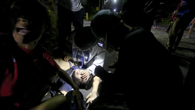 Such measures are meant to fend off raids like one on June 7 when armed pro-government youths rushed the building. Shots rang out and students ran to a barricade where they found 19-year-old Chester Chavarria wounded by gunfire. (Esteban Felix / AP)