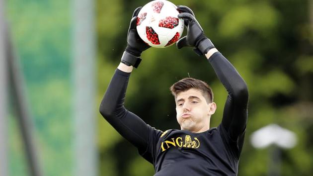 Belgium goalkeeper Thibaut Courtois warms up on Thursday at the Guchkovo Stadium in Dedovsk, outside Moscow. (AP)