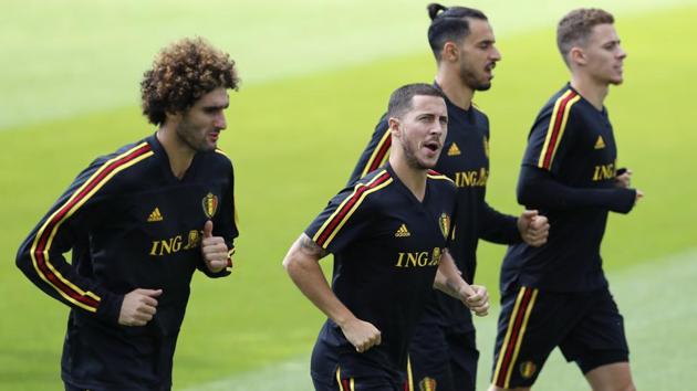 Belgium's Marouane Fellaini (L), Eden Hazard (2nd L), Nacer Chadli (2nd R) and Thorgan Hazard warm up during a session ahead of their FIFA World Cup quarterfinal against Brazil at the Kazan Arena on Friday. (AP)