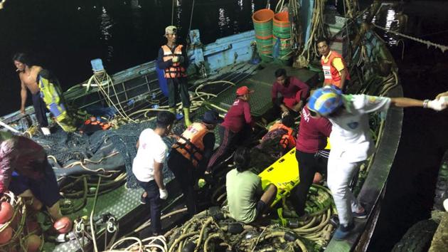 In this photo released by the Thailand Royal Police, rescued tourists from a boat that sank are helped onto a pier from a fishing boat Thursday, July 5, 2018, on the island of Phuket, southern Thailand. (AP) In this photo released by the Thailand Royal Police, rescued tourists from a boat that sank are helped onto a pier from a fishing boat Thursday, July 5, 2018, on the island of Phuket, southern Thailand. (AP)