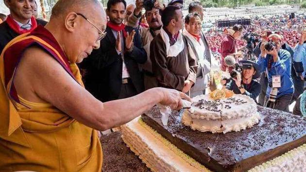 Tibetan spiritual leader Dalai Lama is seen cutting a cake on his 83rd birthday in Ladakh. Tibetans across India observed the birthday of their spiritual leader with special prayers, traditional dances, music and with birthday cakes, hoping for his longevity and well-being. (ANI) Tibetan spiritual leader Dalai Lama is seen cutting a cake on his 83rd birthday in Ladakh. Tibetans across India observed the birthday of their spiritual leader with special prayers, traditional dances, music and with birthday cakes, hoping for his longevity and well-being. (ANI)