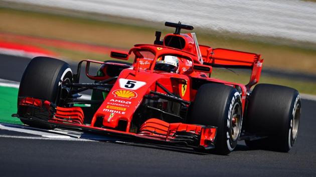 Ferrari's Sebastian Vettel drives during the second practice session at Silverstone motor racing circuit on Friday.(AFP)