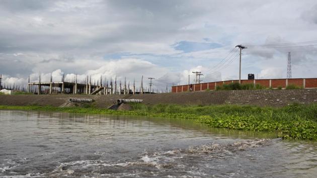 In April 2017, under international pressure, the government shut off power at Hazaribagh, ordering them to move to a new tannery industrial complex in Savar. Now the AP has learned that factories at the new location are draining chemicals into the Daleshwari River and dumping toxic waste in open fields. (A.M Ahad / AP) In April 2017, under international pressure, the government shut off power at Hazaribagh, ordering them to move to a new tannery industrial complex in Savar. Now the AP has learned that factories at the new location are draining chemicals into the Daleshwari River and dumping toxic waste in open fields. (A.M Ahad / AP)