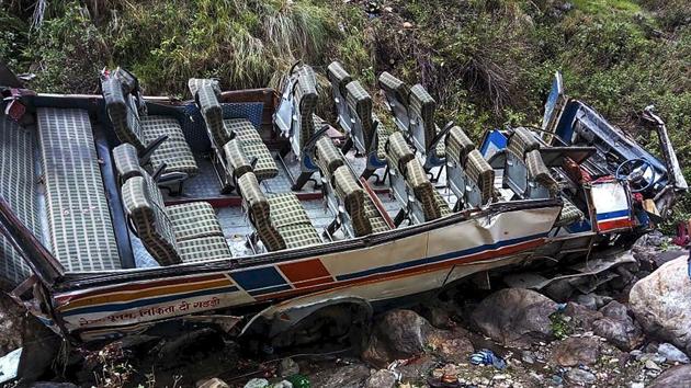 The mangled remains of a bus that fell into a gorge. At least 48 people were killed and 12 others injured in the accident. (PTI) The mangled remains of a bus that fell into a gorge. At least 48 people were killed and 12 others injured in the accident. (PTI)