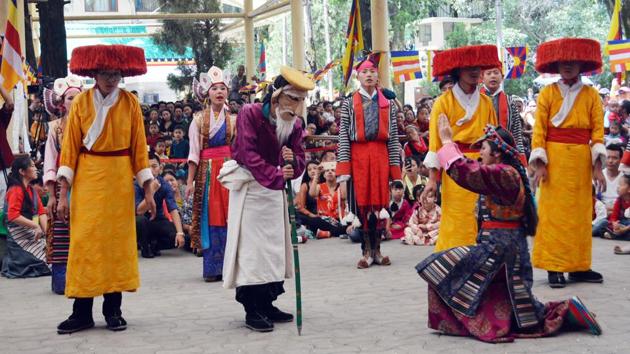 Tibetan artists perform traditional dances as part of the celebrations in McLeodganj.  (Shyam Sharma / HT Photo) 