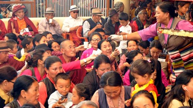 The cake is distributed among the attendees. The Dalai Lama was awarded the Nobel Peace Prize in 1989 for his non-violent campaign for democracy and freedom in his homeland. Since escaping to India, he has spent his time in exile pushing for autonomy for Tibet. (Shyam Sharma / HT Photo) 