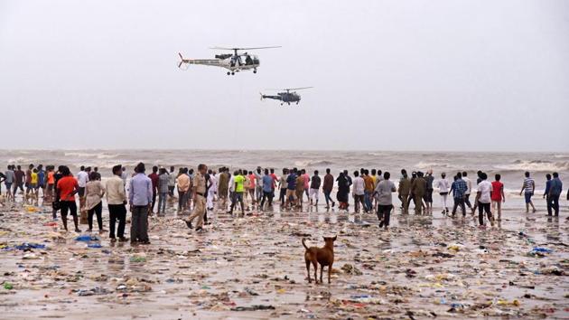 A Navy and a Coast Guard Chetak helicopter fly over the Juhu beach during a search operation to find the fourth person who is feared to have been drowned on Thursday night at Juhu Chowpatty in Mumbai. The bodies of the other three youngsters have been recovered. The four – all 17-year-olds – have been identified as Fardeen Saudagar, Sohail Khan, Faisal Shaikh and Nazir Gazi. (PTI) A Navy and a Coast Guard Chetak helicopter fly over the Juhu beach during a search operation to find the fourth person who is feared to have been drowned on Thursday night at Juhu Chowpatty in Mumbai. The bodies of the other three youngsters have been recovered. The four – all 17-year-olds – have been identified as Fardeen Saudagar, Sohail Khan, Faisal Shaikh and Nazir Gazi. (PTI)