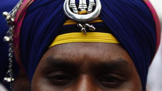 A Sikh man takes part in a protest against a suicide attack on Sikhs in Jalalabad in Afghanistan, in New Delhi on July 3, 2018. (Money Sharma / AFP)
