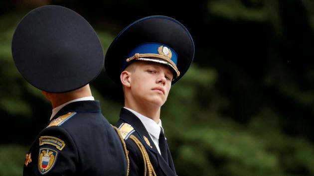 Members of the honour guard attend the changing of guards ceremony at the Tomb of the Unknown Soldier by the Kremlin wall in central Moscow during the soccer World Cup, Russia. (Christian Hartmann / REUTERS)