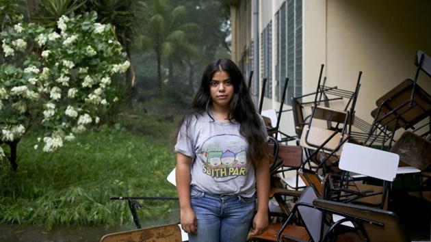 Students like Valeska Sandoval have barricaded themselves inside their school, stacking desks to limit access points to buildings. They say it’s the only place they feel safe and they’ve been joined by students from other schools. (Esteban Felix / AP)