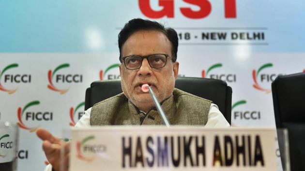 Hasmukh Adhia addresses during a session on 'One Year Journey Of GST' at FICCI office, in New Delhi.(PTI Photo)