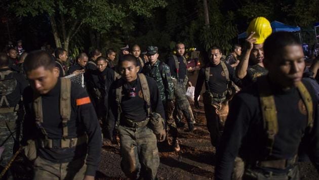 Thai soldiers are seen at the Tham Luang cave area as operations continue for the 12 boys and their coach trapped at the cave in Khun Nam Nang Non Forest Park in the Mae Sai district of Chiang Rai province on July 6.(AFP Photo) Thai soldiers are seen at the Tham Luang cave area as operations continue for the 12 boys and their coach trapped at the cave in Khun Nam Nang Non Forest Park in the Mae Sai district of Chiang Rai province on July 6.(AFP Photo)