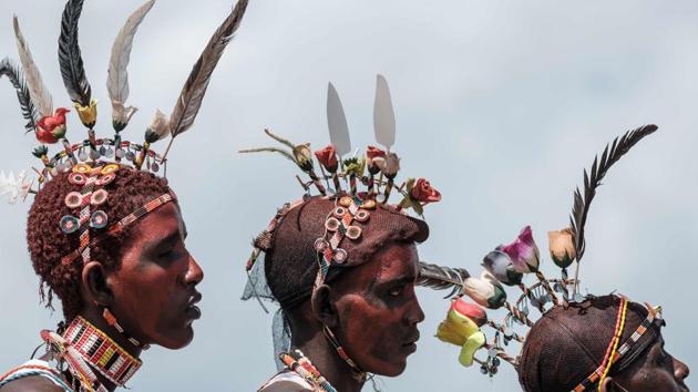 Men of the Samburu tribe perform during the 11th Marsabit Lake Turkana Culture Festival in Loiyangalani near Lake Turkana, northern Kenya. (Yasuyoshi Chiba / AFP)
