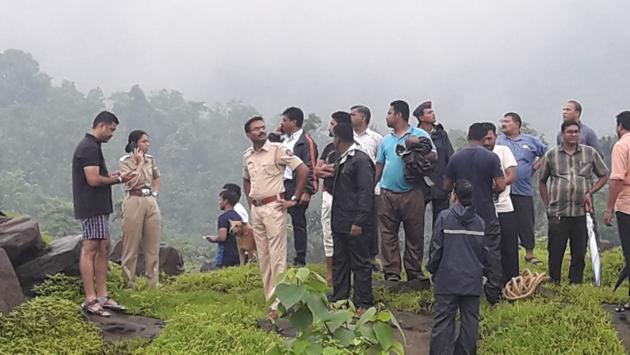 A 19-member team from the National Disaster Response Force (NDRF) are at the waterfall. (HT Photo) A 19-member team from the National Disaster Response Force (NDRF) are at the waterfall. (HT Photo)