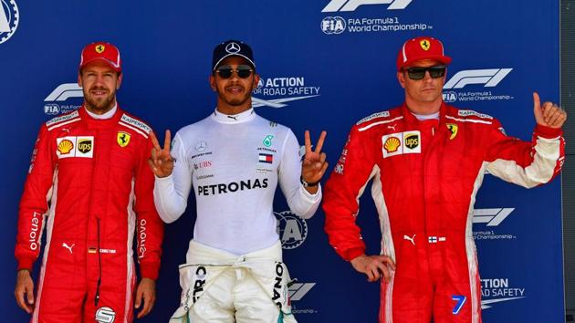 Lewis Hamilton outpaced Sebastian Vettel by 0.044 seconds to secure pole position in the British Grand Prix.(AFP)