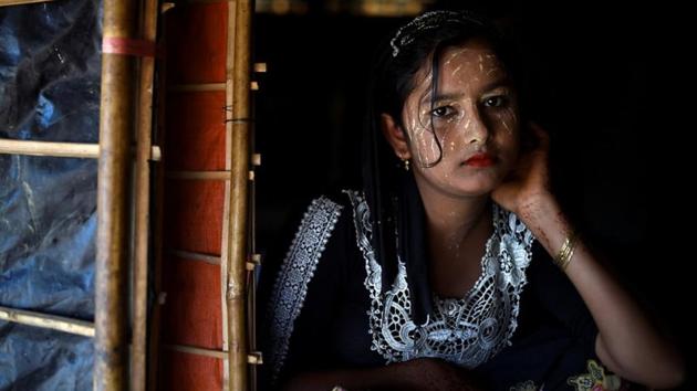 “The make-up is my hobby, and it’s our tradition,” said Juhara Begum, 13, who arrived in Cox’s Bazar in September last year after fleeing a military attack on her village in Myanmar’s Rakhine state. “I live on top of the hill and it is too hot with the strong sun,” said Juhara, who wore the protective paste on her face. (Clodagh Kilcoyne / REUTERS) “The make-up is my hobby, and it’s our tradition,” said Juhara Begum, 13, who arrived in Cox’s Bazar in September last year after fleeing a military attack on her village in Myanmar’s Rakhine state. “I live on top of the hill and it is too hot with the strong sun,” said Juhara, who wore the protective paste on her face. (Clodagh Kilcoyne / REUTERS)