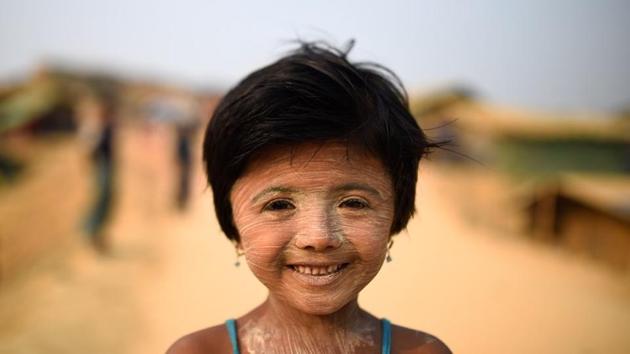 Nur Kayas, 6, poses for a photograph. Thanaka cream has been used by Burmese women for more than 2000 years. (Clodagh Kilcoyne / REUTERS) Nur Kayas, 6, poses for a photograph. Thanaka cream has been used by Burmese women for more than 2000 years. (Clodagh Kilcoyne / REUTERS)