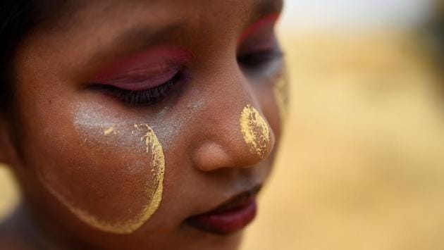 Portrait of 10-year-old Majuma as she wears thanaka paste at a refugee camp. There are more than 700,000 Rohingya who have taken shelter in the district after fleeing a military crackdown in Myanmar last year, the United Nations and human rights groups said. (Clodagh Kilcoyne / REUTERS) Portrait of 10-year-old Majuma as she wears thanaka paste at a refugee camp. There are more than 700,000 Rohingya who have taken shelter in the district after fleeing a military crackdown in Myanmar last year, the United Nations and human rights groups said. (Clodagh Kilcoyne / REUTERS)