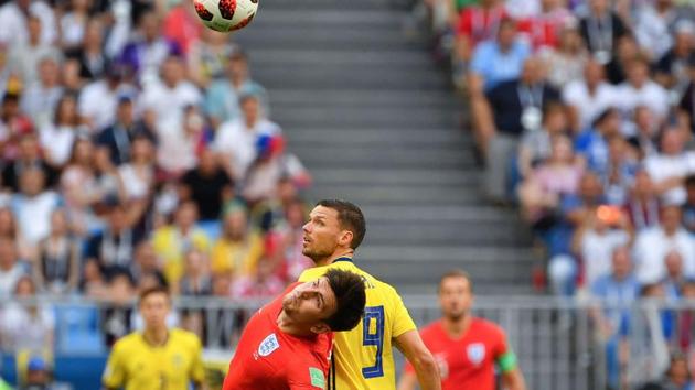 England's defender Harry Maguire (L) vies with Sweden's forward Marcus Berg during the Russia 2018 World Cup quarter-final football match between Sweden and England at the Samara Arena. (AFP) England's defender Harry Maguire (L) vies with Sweden's forward Marcus Berg during the Russia 2018 World Cup quarter-final football match between Sweden and England at the Samara Arena. (AFP)