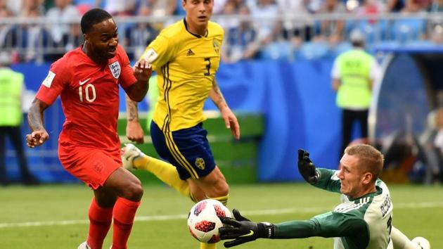 England's forward Raheem Sterling (L) vies with Sweden's goalkeeper Robin Olsen (R) past Sweden's defender Victor Lindelof during the Russia 2018 World Cup quarter-final football match between Sweden and England at the Samara Arena. (AFP) England's forward Raheem Sterling (L) vies with Sweden's goalkeeper Robin Olsen (R) past Sweden's defender Victor Lindelof during the Russia 2018 World Cup quarter-final football match between Sweden and England at the Samara Arena. (AFP)