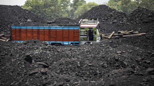 A truck sits parked next to piles of coal at the Tori Siding. A lack of proper extraction methods, land disputes and Naxal fears had first delayed and then hindered production at the Amrapali and Magadh open cast mines. The two mines were touted as giant leaps in Jharkhand’s power generation and job creation efforts. (Prashanth Vishwanathan / Bloomberg) A truck sits parked next to piles of coal at the Tori Siding. A lack of proper extraction methods, land disputes and Naxal fears had first delayed and then hindered production at the Amrapali and Magadh open cast mines. The two mines were touted as giant leaps in Jharkhand’s power generation and job creation efforts. (Prashanth Vishwanathan / Bloomberg)