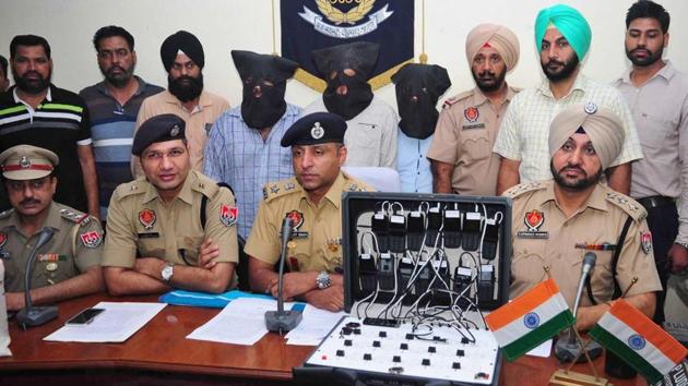 DCP Gaganajit Singh and his team addressing the media after the arrest of three of the accused from a hotel in Ludhiana. (HT Photo) DCP Gaganajit Singh and his team addressing the media after the arrest of three of the accused from a hotel in Ludhiana. (HT Photo)