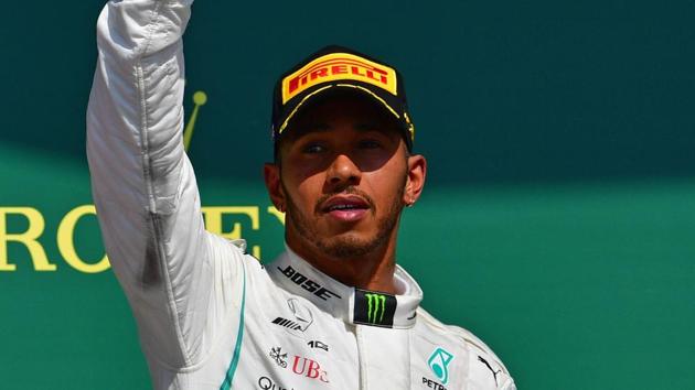 Mercedes’ Lewis Hamilton finished second at the British Grand Prix after an opening lap collision with Ferrari’s Kimi Raikkonen, who finished third, had knocked him from pole position to last.(AFP)