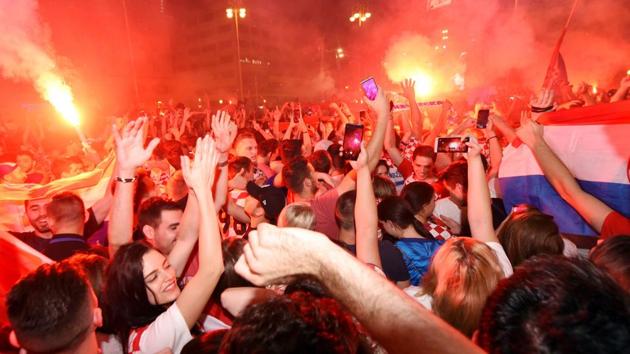 Croatia's fans celebrate victory against Russia in the Croatian capital Zagreb's main square after the FIFA World Cup 2018 quarterfinal.(AFP)