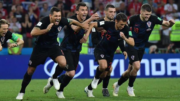 Croatia's players celebrate their winning penalty during the FIFA World Cup 2018 quarterfinal against hosts Russia at the Fisht Stadium in Sochi.(AFP)