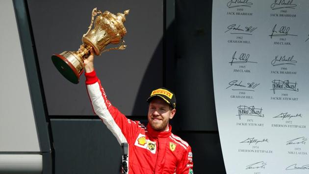 Ferrari’s Sebastian Vettel (in pic) won the British Grand Prix as Mercedes’ Lewis Hamilton fought back to finish second.(REUTERS) Ferrari’s Sebastian Vettel (in pic) won the British Grand Prix as Mercedes’ Lewis Hamilton fought back to finish second.(REUTERS)