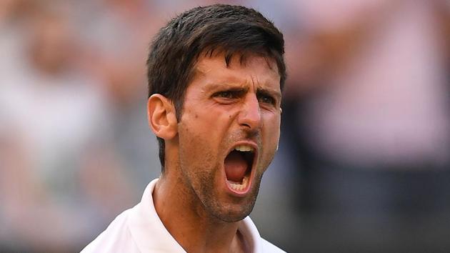 Serbia's Novak Djokovic reacts after winning against Britain's Kyle Edmund during their men's singles third round match on the sixth day of the 2018 Wimbledon Championships at The All England Lawn Tennis Club in Wimbledon.(AFP)