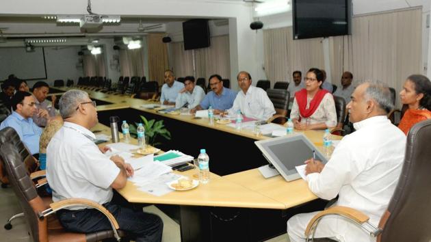 School education minister Arvind Pandey at a meeting with the officials of education department and SIT, in Dehradun on Monday.(HT Photo)