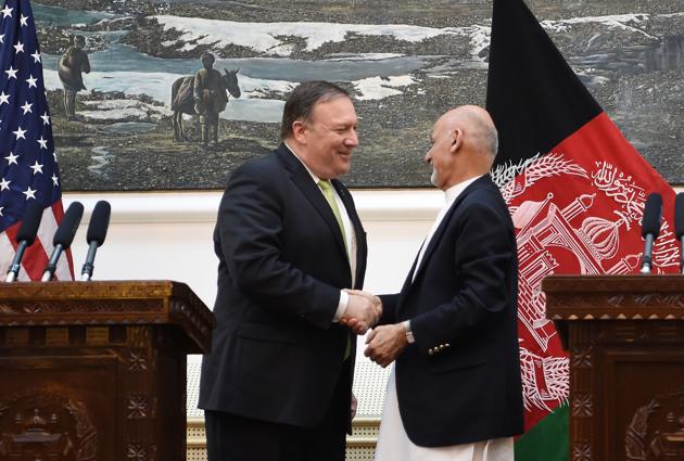 US Secretary of State Mike Pompeo (L) shakes hands with Afghan President Ashraf Ghani (R) after a press conference at the Presidential Palace in Kabul on July 9, 2018.(AFP)