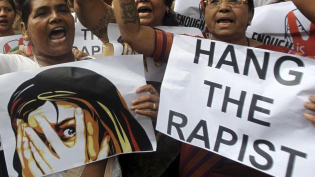 Women activists hold placards demanding the death penalty for rapists. India is one of only three countries in the world which expanded the scope of death penalty by adopting new laws.(AP File Photo)