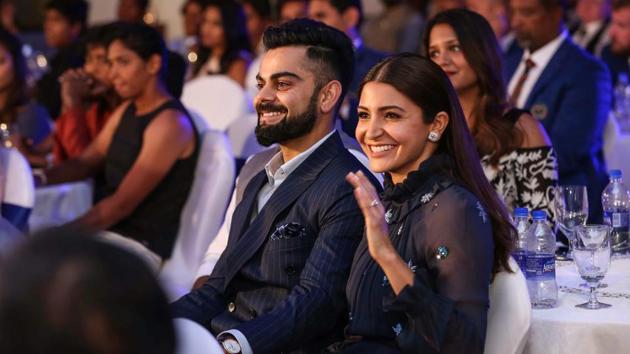 Virat Kohli and Anushka Sharma were spotted out and about Cardiff, where they even posed with fans for photographs.(PTI)